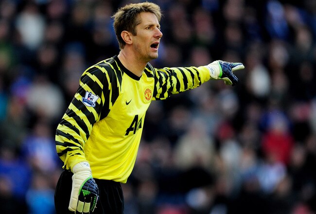 WIGAN, ENGLAND - FEBRUARY 26:  Edwin van der Sar of Manchester United gestures during the Barclays Premier League match between Wigan Athletic and Manchester United at the DW Stadium on February 26, 2011 in Wigan, England.  (Photo by Jamie McDonald/Getty