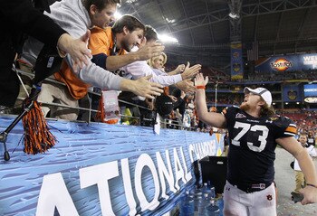 GLENDALE, AZ - JANUARY 10:  Lee Ziemba #73 of the Auburn Tigers celebrates their 22-19 victory after defeating the Oregon Ducks in the Tostitos BCS National Championship Game at University of Phoenix Stadium on January 10, 2011 in Glendale, Arizona.  (Pho