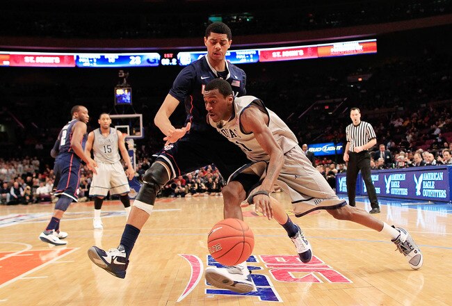 NEW YORK, NY - MARCH 09:  Jason Clark #21 of the Georgetown Hoyas drives against Jeremy Lamb #3 of the Connecticut Huskies during the second round of the 2011 Big East Men's Basketball Tournament presented by American Eagle Outfitters at Madison Square Ga