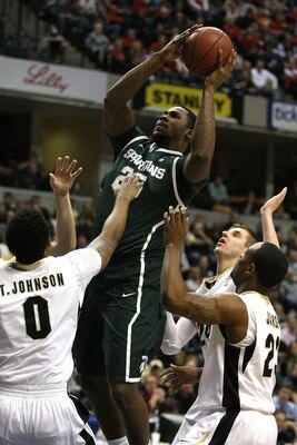 INDIANAPOLIS, IN - MARCH 11:  Derrick Nix #25 of the Michigan State Spartans attempts a shot in the first half against the Purdue Boilermakers during the quarterfinals of the 2011 Big Ten Men's Basketball Tournament at Conseco Fieldhouse on March 11, 2011