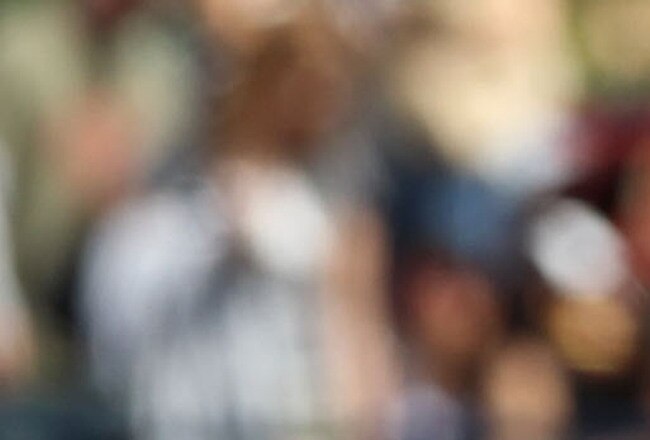 PEORIA, AZ - MARCH 06:  Starting pitcher Mat Latos #38 of the San Diego Padres walks off the field after being removed from the spring training game against the Oakland Athletics at Peoria Stadium on March 6, 2011 in Peoria, Arizona.  (Photo by Christian