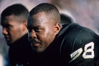 LOS ANGELES, CA - OCTOBER 25:  John Clay #78 of the Los Angeles Raiders watches from the sideline during the game against the Seattle Seahawks at the Los Angeles Memorial Coliseum on October 25, 1987 in Los Angeles, California.  The Seahawks won 35-13. (P