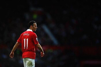 MANCHESTER, ENGLAND - MARCH 19: Ryan Giggs of Manchester United looks on during the Barclays Premier League match between Manchester United and Bolton Wanderers at Old Trafford on March 19, 2011 in Manchester, England.  (Photo by Laurence Griffiths/Getty