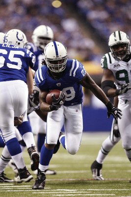 INDIANAPOLIS, IN - DECEMBER 27: Joseph Addai #29 of the Indianapolis Colts runs for a 21-yard touchdown in the first quarter against the New York Jets at Lucas Oil Stadium on December 27, 2009 in Indianapolis, Indiana. (Photo by Joe Robbins/Getty Images)