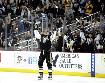 PITTSBURGH, PA - MARCH 08:  Zbynek Michalek #4 of the Pittsburgh Penguins celebrates his first goal of the season against the Buffalo Sabres at Consol Energy Center on March 8, 2011 in Pittsburgh, Pennsylvania.  (Photo by Justin K. Aller/Getty Images)