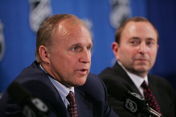 NEW YORK - JULY 22:  Colin Campbell (L), Executive Vice President and Director of Hockey Operations, and Commissioner Gary Bettman of the National Hockey League address the media regarding NHL rules changes and the new CBA agreement at the Sheraton New Yo