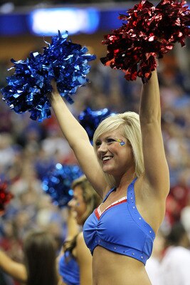 TULSA, OK - MARCH 20:  Cheerleaders for the Kansas Jayhawks perform during the third round game against the Illinois Fighting Illini in the 2011 NCAA men's basketball tournament at BOK Center on March 20, 2011 in Tulsa, Oklahoma.  (Photo by Ronald Martine