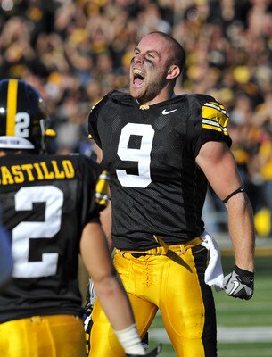 IOWA CITY, IA - OCTOBER 30- Cornerback Tyler Sash of the University of Iowa Hawkeyes celebrates after intercepting a pass during the first half of an NCAA college football game against the Michigan State Spartans at Kinnick Stadium on October 30, 2010 in