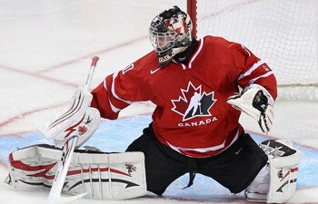 BUFFALO, NY - JANUARY 03: Mark Visentin #30 of Canada makes a save against the United States  during the 2011 IIHF World U20 Championship Semi Final game between United States and Canada on January 3, 2011 in Buffalo, New York.  (Photo by Rick Stewart/Get