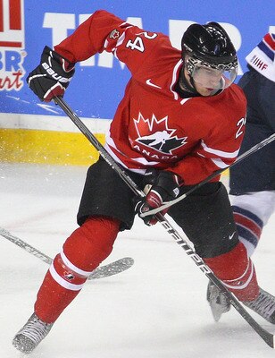 BUFFALO, NY - JANUARY 03:  Calvin de Haan #24 of Canada skates against Jeremy Morin #11 of the United States during the 2011 IIHF World U20 Championship Semi Final game between United States and Canada on January 3, 2011 in Buffalo, New York. Canada won 4