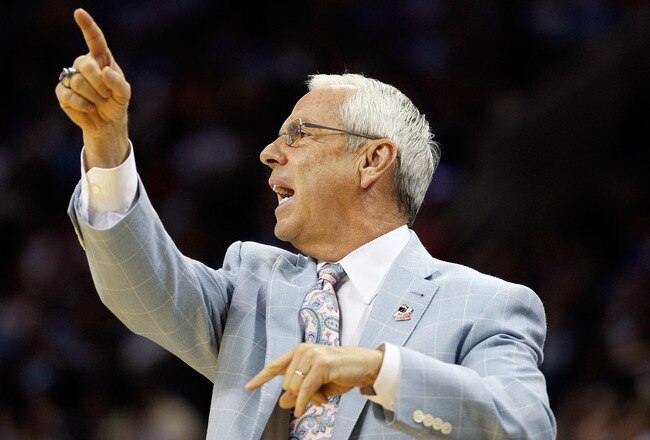 CHARLOTTE, NC - MARCH 20:  Head coach Roy Williams of the North Carolina Tar Heels reacts while taking on the Washington Huskies during the third round of the 2011 NCAA men's basketball tournament at Time Warner Cable Arena on March 20, 2011 in Charlotte,
