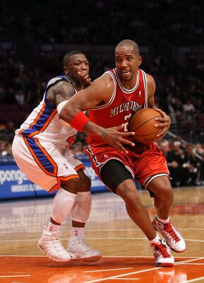 NEW YORK - DECEMBER 19: Michael Redd #22 of the Milwaukee Bucks drives to the basket against Nate Robinson #4 of the New York Knicks on December 19, 2008 at Madison Square Garden in New York City, New York. NOTE TO USER: User expressly acknowledges and ag