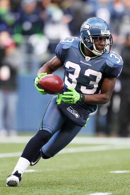 SEATTLE, WA - JANUARY 08:  Leon Washington #33 of the Seattle Seahawks runs down field against the New Orleans Saints during the 2011 NFC wild-card playoff game at Qwest Field on January 8, 2011 in Seattle, Washington.  (Photo by Otto Greule Jr/Getty Imag