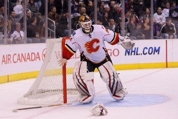 LOS ANGELES, CA - MARCH 21:  Goaltender Miikka Kiprusoff #34 of the Calgary Flames loses his stick and blocker during their NHL game against the Los Angeles Kings at Staples Center on March 21, 2011 in Los Angeles, California. The Kings defeated the Flame