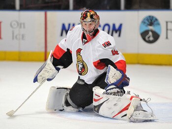 NEW YORK, NY - MARCH 24: Craig Anderson #41 of the Ottawa Senators makes a save during overtime against the New York Rangers at Madison Square Garden on March 24, 2011 in New York City. The Senators defeated the Rangers 2-1 in a shootout. (Photo by Christ