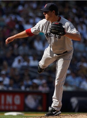 NEW YORK - AUGUST 07:  John Lackey #40 of the Boston Red Sox delivers a pitch in the second-inning against the New York Yankees on August 7, 2010 at Yankee Stadium in the Bronx borough of New York City.  (Photo by Mike Stobe/Getty Images)