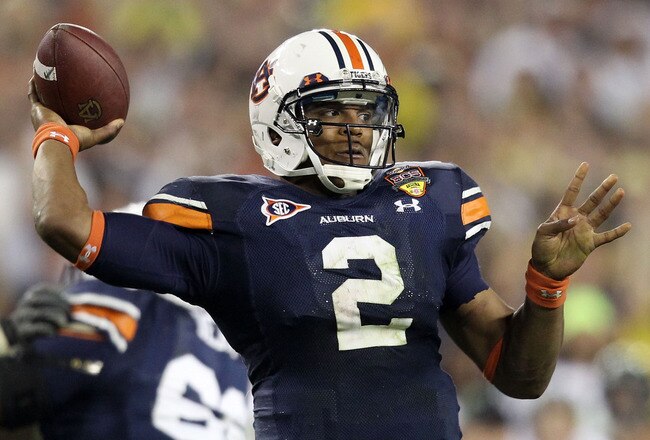GLENDALE, AZ - JANUARY 10:  Cameron Newton #2 of the Auburn Tigers scrambles against the Oregon Ducks during the Tostitos BCS National Championship Game at University of Phoenix Stadium on January 10, 2011 in Glendale, Arizona.  (Photo by Christian Peters
