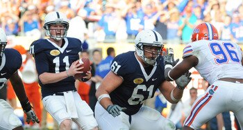 TAMPA, FL - JANUARY 1:  Guard Stefan Wisniewski #61 of the Penn State Nittany Lions blocks against the Florida Gators January 1, 2010 in the 25th Outback Bowl at Raymond James Stadium in Tampa, Florida.  (Photo by Al Messerschmidt/Getty Images)