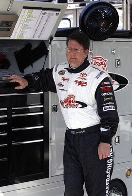 DAYTONA BEACH, FL - FEBRUARY 11:  Johnny Benson, driver of the #1 K&N Toyota, stands in garage area during practice for the NASCAR Camping World Truck Series NextEra Energy Resources 250 at Daytona International Speedway on February 11, 2009 in Daytona Be