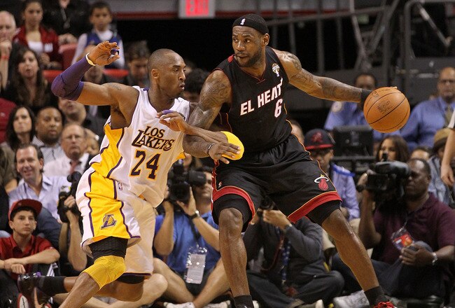 MIAMI, FL - MARCH 10:  LeBron James #6 of the Miami Heat posts up Kobe Bryant #24 of  the Los Angeles Lakers  during a game at American Airlines Arena on March 10, 2011 in Miami, Florida. NOTE TO USER: User expressly acknowledges and agrees that, by downl