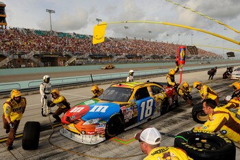 HOMESTEAD, FL - NOVEMBER 22:  Kyle Busch, driver of the #18 M&M's Toyota, pits during the NASCAR Sprint Cup Series Ford 400 at Homestead-Miami Speedway on November 22, 2009 in Homestead, Florida.  (Photo by Rusty Jarrett/Getty Images for NASCAR)