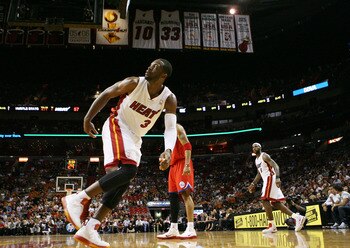 MIAMI, FL - MARCH 25:  Guard Dwyane Wade #3 of the Miami Heat reacts during a game againts the Philadelphia Sixers at American Airlines Arena on March 25, 2011 in Miami, Florida. NOTE TO USER: User expressly acknowledges and agrees that, by downloading an