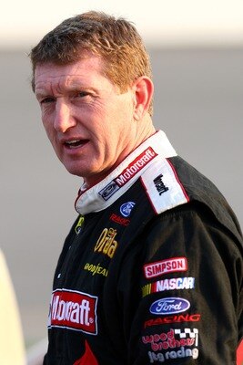 RICHMOND, VA - SEPTEMBER 07: Bill Elliott, driver of the #21 Air Force Ford, stands on the grid during qualifying for the NASCAR Nextel Cup Series Chevy Rock & Roll 400 at Richmond International Raceway on September 7, 2007 in Richmond, Virginia.  (Photo