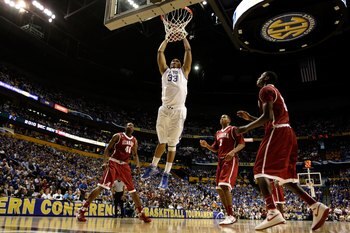 Daniel Orton dunks the basketball in college.