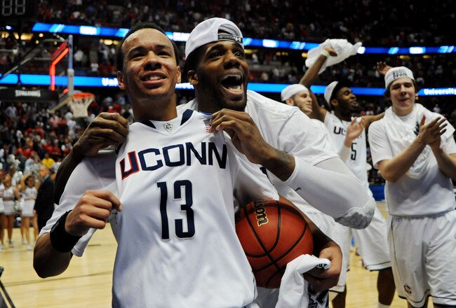 ANAHEIM, CA - MARCH 26:  Shabazz Napier #13 and Alex Oriakhi #34 of the Connecticut Huskies celebrate after defeating the Arizona Wildcats during the west regional final of the 2011 NCAA men's basketball tournament at the Honda Center on March 26, 2011 in