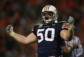 AUBURN, AL - NOVEMBER 24:  Offensive lineman Ryan Pugh #50 of the Auburn Tigers celebrates after picking up a first down with less than a minute to play in the game against the Alabama Crimson Tide at Jordan-Hare Stadium on November 24, 2007 in Auburn, Al