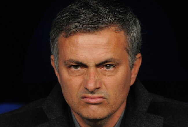MADRID, SPAIN - MARCH 16:  Head coach Jose Mourinho of Real Madrid looks on before the start of the UEFA Champions League round of 16 second leg match between Real Madrid and Lyon at Estadio Santiago Bernabeu on March 16, 2011 in Madrid, Spain.  (Photo by