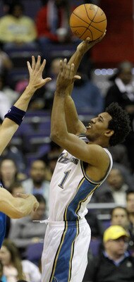 WASHINGTON, DC - FEBRUARY 26: Nick Young #1 of the Washington Wizards shoots over Jason Kidd #2 of the Dallas Mavericks at the Verizon Center on February 26, 2011 in Washington, DC. NOTE TO USER: User expressly acknowledges and agrees that, by downloading