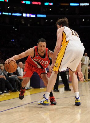 LOS ANGELES, CA - MARCH 20:  Brandon Roy #7 of the Portland Trail Blazers dribbles as he is defended by Pau Gasol #16 of the Los Angeles Lakers at the Staples Center on March 20, 2011 in Los Angeles, California.  NOTE TO USER: User expressly acknowledges