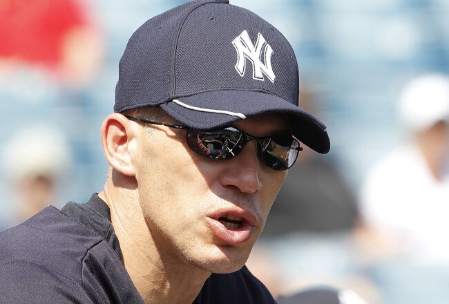 TAMPA, FL - FEBRUARY 20: Manager Joe Girardi #28 of the New York Yankees watch the action during the first full team workout of Spring Training on February 20, 2011 at the George M. Steinbrenner Field in Tampa, Florida.  (Photo by Leon Halip/Getty Images)