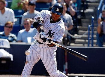TAMPA, FL - FEBRUARY 26:  Infielder Robinson Cano #24 of the New York Yankees fouls off a pitch against the Philadelphia Phillies during a Grapefruit League Spring Training Game at George M. Steinbrenner Field on February 26, 2011 in Tampa, Florida.  (Pho