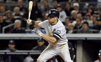 NEW YORK - OCTOBER 18:  Brett Gardner #11 of the New York Yankees hits a single in the bottom of the sixth inning against the Texas Rangers in Game Three of the ALCS during the 2010 MLB Playoffs at Yankee Stadium on October 18, 2010 in New York, New York.