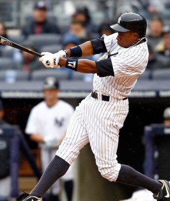 NEW YORK, NY - MARCH 31:  Curtis Granderson #14 of the New York Yankees homers to right field in the seventh inning against the Detroit Tigers on Opening Day at Yankee Stadium on March 31, 2011 in the Bronx borough of New York City. The Yankees won 6-3 in