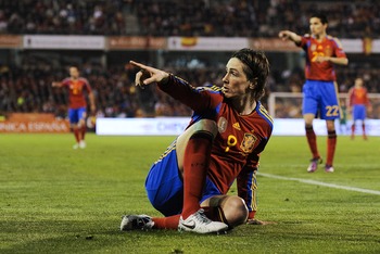 GRANADA, SPAIN - MARCH 25: Fernando Torres of Spain points during the UEFA EURO 2012 qualifier between Spain and Czech Republic at Los Carmenes Stadium on March 25, 2011 in Granada, Spain. Spain won 2-1. (Photo by David Ramos/Getty Images)
