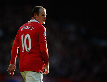 MANCHESTER, ENGLAND - MARCH 19: Wayne Rooney of Manchester United looks on during the Barclays Premier League match between Manchester United and Bolton Wanderers at Old Trafford on March 19, 2011 in Manchester, England. (Photo by Laurence Griffiths/Gett