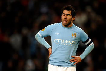 MANCHESTER, ENGLAND - MARCH 17: Carlos Tevez of Manchester City shuts his eyes during the UEFA Europa League round of 16 second leg match between Manchester City and Dynamo Kiev at City of Manchester Stadium on March 17, 2011 in Manchester, England. (Ph