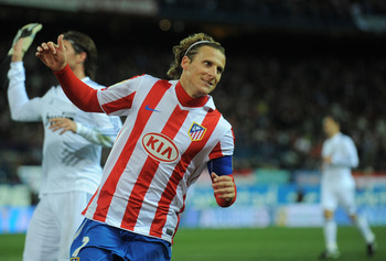 MADRID, SPAIN - JANUARY 20: Diego Forlan of Atletico Madrid reacts during the Copa del Rey quarter final second leg match between Atletico Madrid and Real Madrid at Vicente Calderon Stadium on January 20, 2011 in Madrid, Spain. (Photo by Denis Doyle/Get