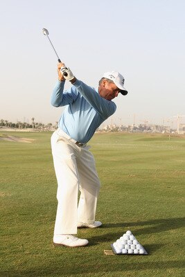 ABU DHABI, UNITED ARAB EMIRATES - FEBRUARY 06: Academy Member Gary Player in action during the Laureus Golf Challenge at the Saadiyat Beach Golf Club part of the 2011 Laureus World Sports Awards on February 6, 2011 in Abu Dhabi, United Arab Emirates.  (Ph