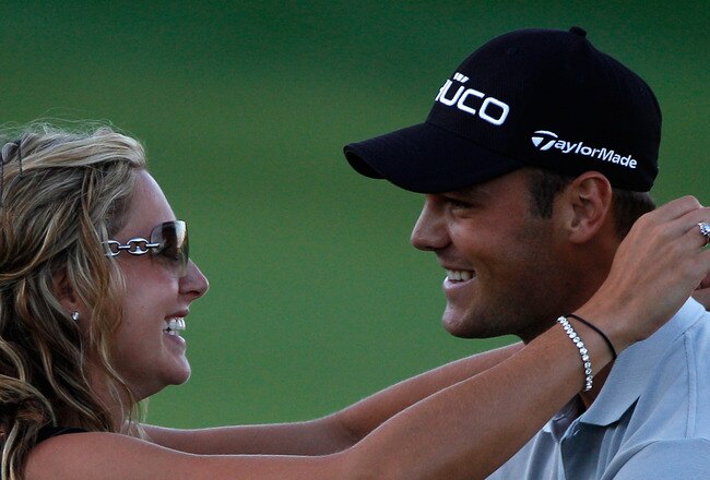 KOHLER, WI - AUGUST 15:  Martin Kaymer of Germany (R) celebrates with his girlfriend Allison Micheletti (L) on the 18th green after the three-hole aggregate playoff following the final round of the 92nd PGA Championship on the Straits Course at Whistling