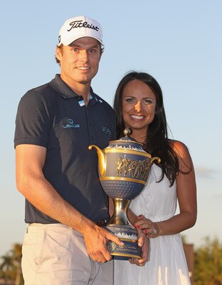 DORAL, FL - MARCH 13:  Nick Watney poses with his wife Amber and the Gene Sarazen trophy after his two-stroke victory at the 2011 WGC- Cadillac Championship at the TPC Blue Monster at the Doral Golf Resort and Spa on March 13, 2011 in Doral, Florida.  (Ph