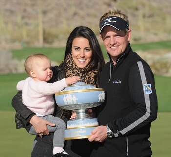 MARANA, AZ - FEBRUARY 27:  Luke Donald of England (R), his wife Diane (C) and daughter Elle (L) celebrate with The Walter Hagen Cup trophy after winning his match 3-up on the 16th hole during the final round of the Accenture Match Play Championship at the