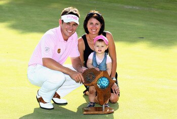 EAST LONDON, SOUTH AFRICA - JANUARY 09:  Louis Oosthuizen of South Africa poses with his wife Nel-Mare and daughter Jana after winning the Africa Open after a three way play-off against Chris Wood of England and Manuel Quiros of Spain at East London GC on