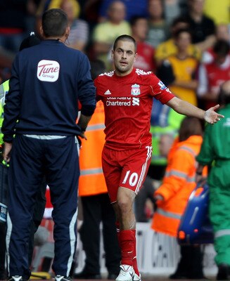 LIVERPOOL, ENGLAND - AUGUST 15:  Joe Cole of Liverpool reacts after being sent off during the Barclays Premier League match between Liverpool and Arsenal at Anfield on August 15, 2010 in Liverpool, England. (Photo by Clive Brunskill/Getty Images)
