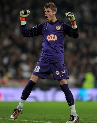 MADRID, SPAIN - JANUARY 13:  David De Gea of Atletico Madrid celebrates his sides opening goal during the quarter-final Copa del Rey first leg match between Real Madrid and Atletico Madrid at Estadio Santiago Bernabeu on January 13, 2011 in Madrid, Spain.