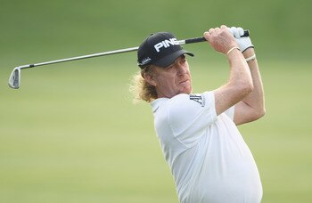 DUBAI, UNITED ARAB EMIRATES - FEBRUARY 10:  Miguel Angel Jimenez of Spain in action during the first round of the 2011 Omega Dubai Desert Classic held on the Majilis Course at the Emirates Golf Club on February 10, 2011 in Dubai, United Arab Emirates.  (P