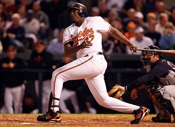 SARASOTA, FL - MARCH 07:  Designated hitter Vladimir Guerrero #27 of the Baltimore Orioles fouls off a pitch against the New York Yankees during a Grapefruit League Spring Training Game at Ed Smith Stadium on March 7, 2011 in Sarasota, Florida.  (Photo by